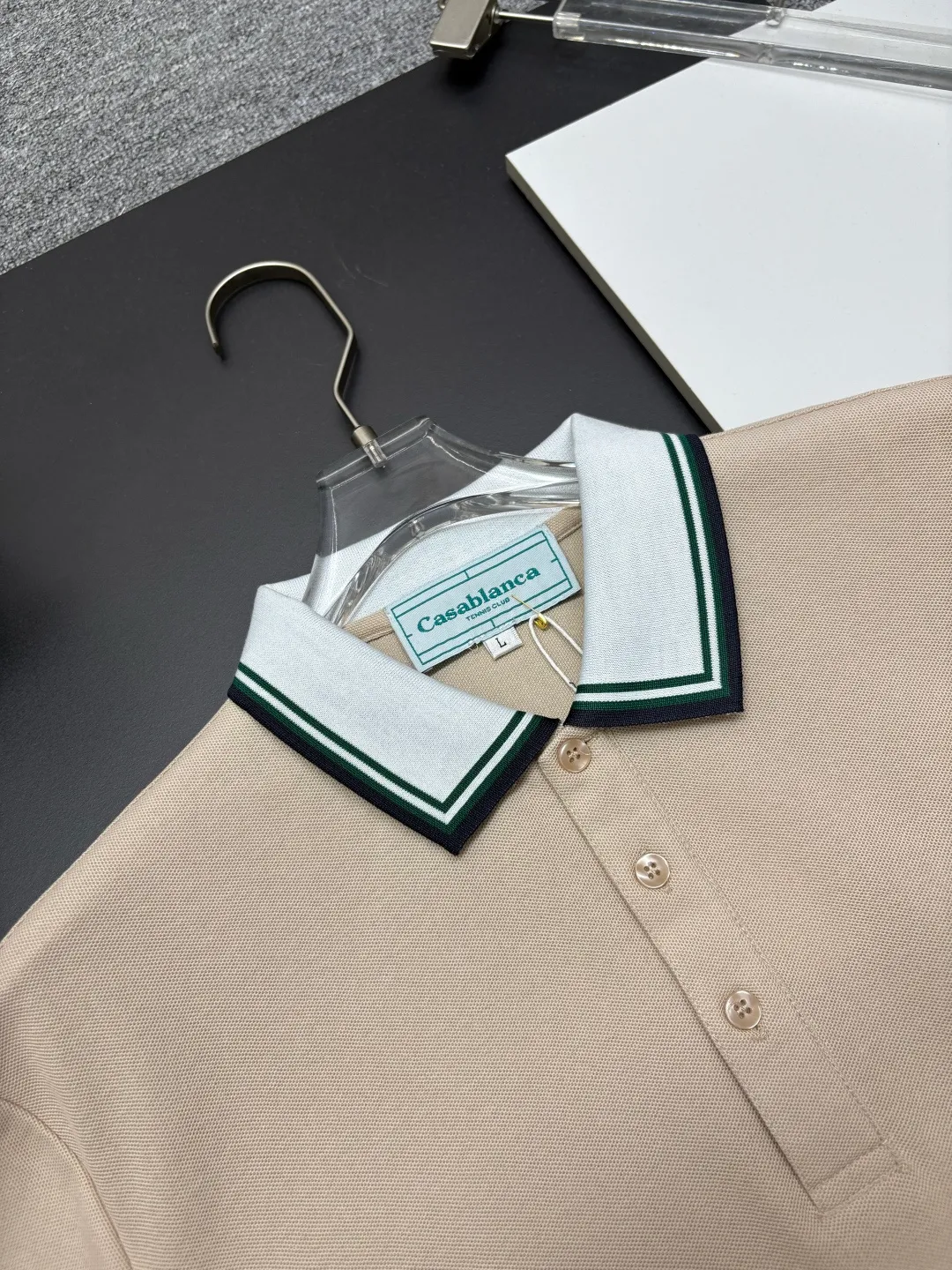 CASABLANCA New Arrival embroidered Polo shirt, original fabric, official Same Style, made of pure cotton pique fabric, customized vat-dyed fabric, feels very comfortable and smooth, very wide and stylish, produced by the first-line brand Factory, imported Behringer embroidery machine, embroidery is full and textured, collar and collar ribs are woven with imported yarn, does not deform after long-term wear, the latest New Arrival style in spring and summer, fashionable and individual Super Versatile, a good-looking one. It is very suitable for both men and women. It is a must-have for everyone. Color: Black White, Apricot, Blue Khaki Size: M-3XL
